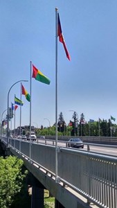 Flags on Whyte Ave's Mill Creek Ravine Bridge