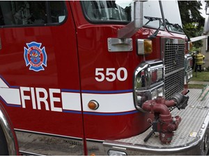 Northwest Edmonton grass fire spreads to old barn